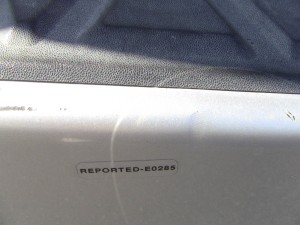 damage stickers on Thrifty rental cars 